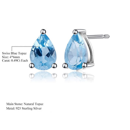 These stunning Art Deco earrings feature pear-shaped Swiss Blue Topaz gems, set perfectly in 925 Sterling Silver.