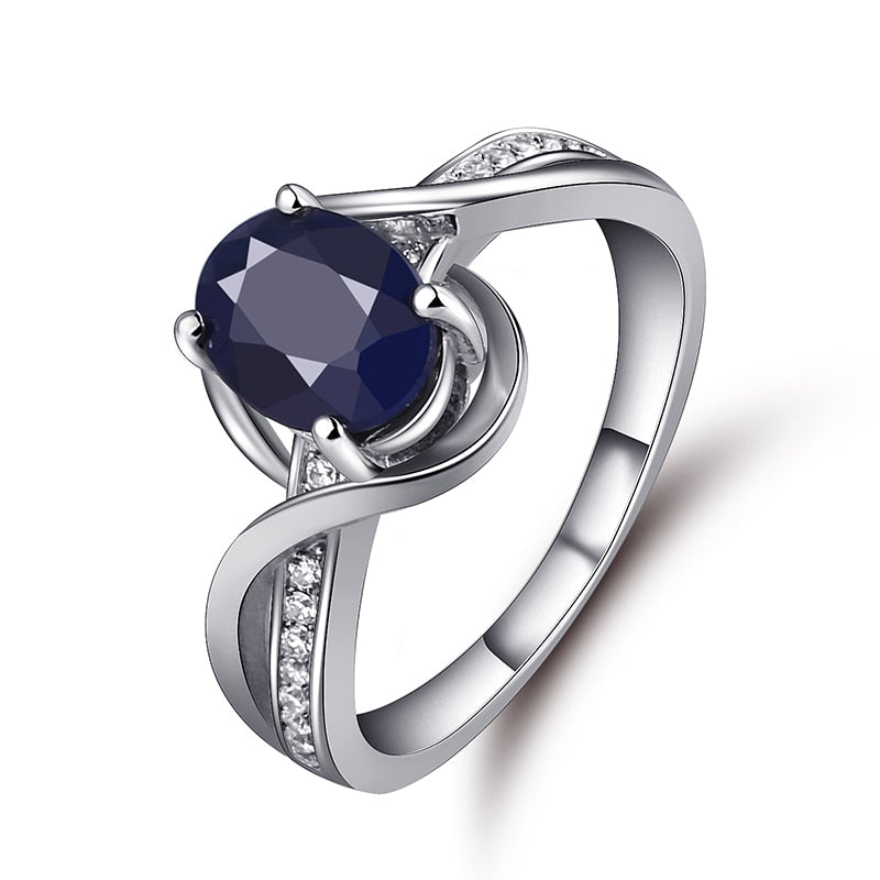 Oval Cut Sapphire Twisted Ring