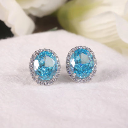 Choosen Jewelry: 925 Sterling Silver Aqua Blue Halo Stud Earrings with Oval Diamond-fire CZ