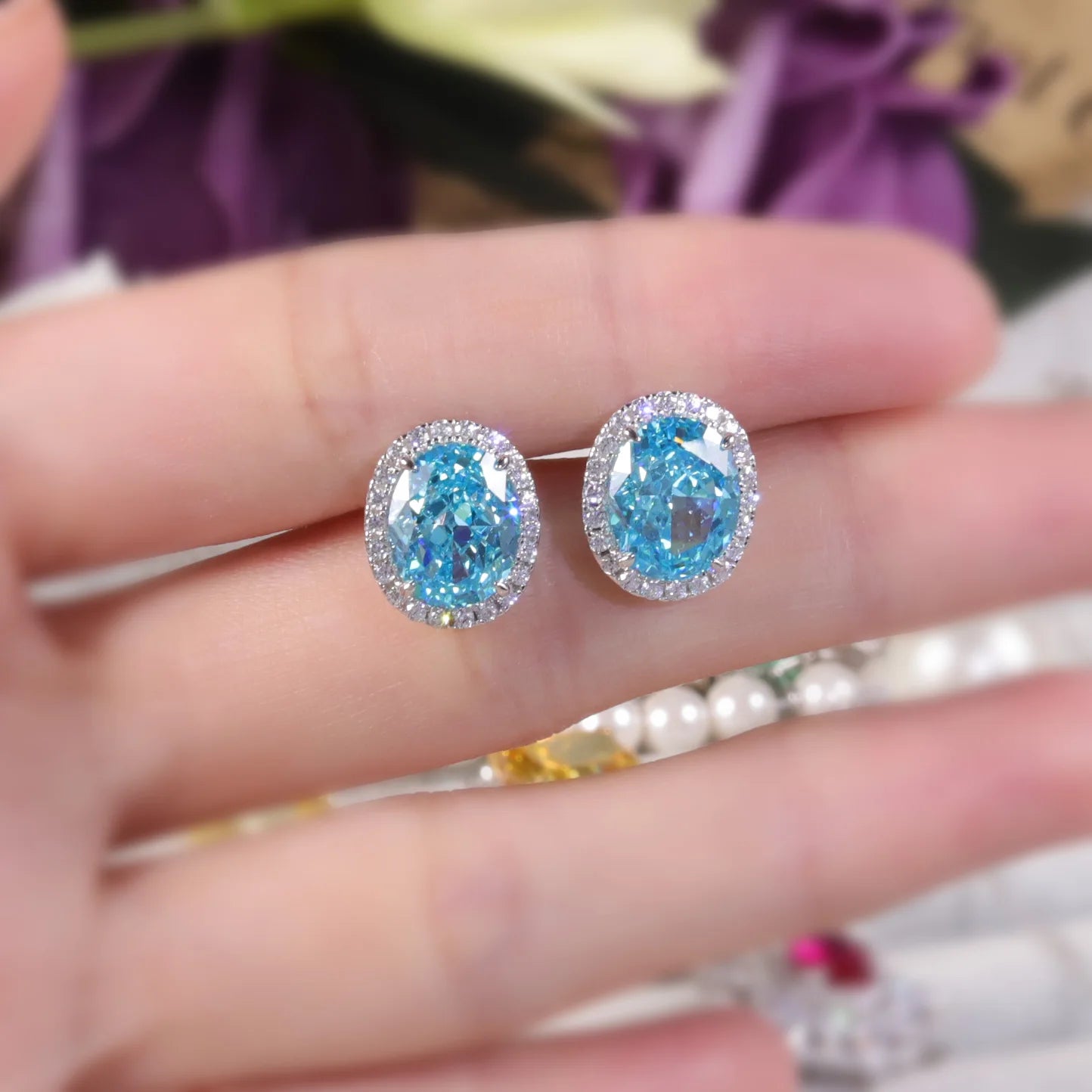 Choosen Jewelry: 925 Sterling Silver Aqua Blue Halo Stud Earrings with Oval Diamond-fire CZ